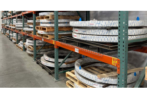 Dyco swing bearings stacked on shelf