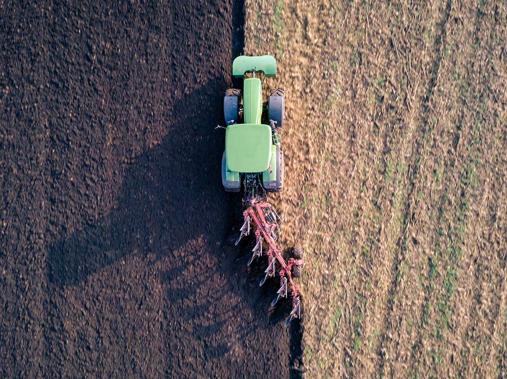 Aerial photo of John Deere tractor working in field