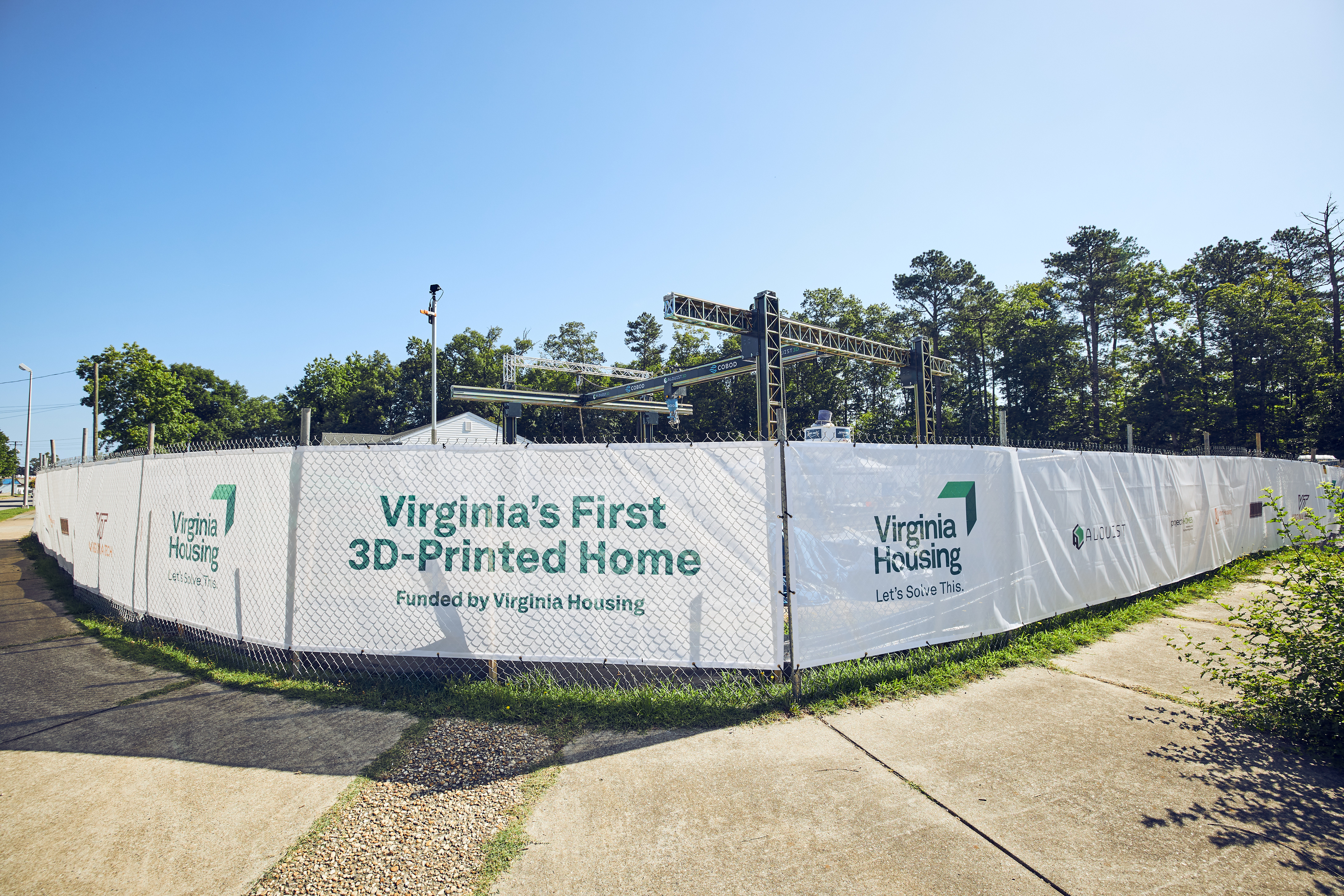 Fence in front of Virginia's first 3D printed home