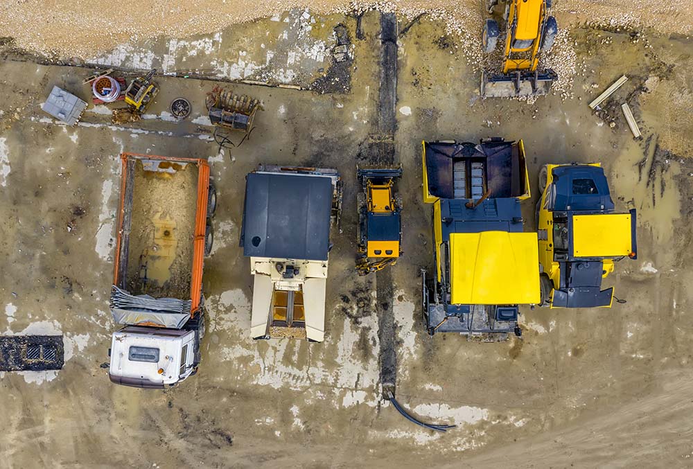 Aerial shot of heavy machinery parked on a jobsite