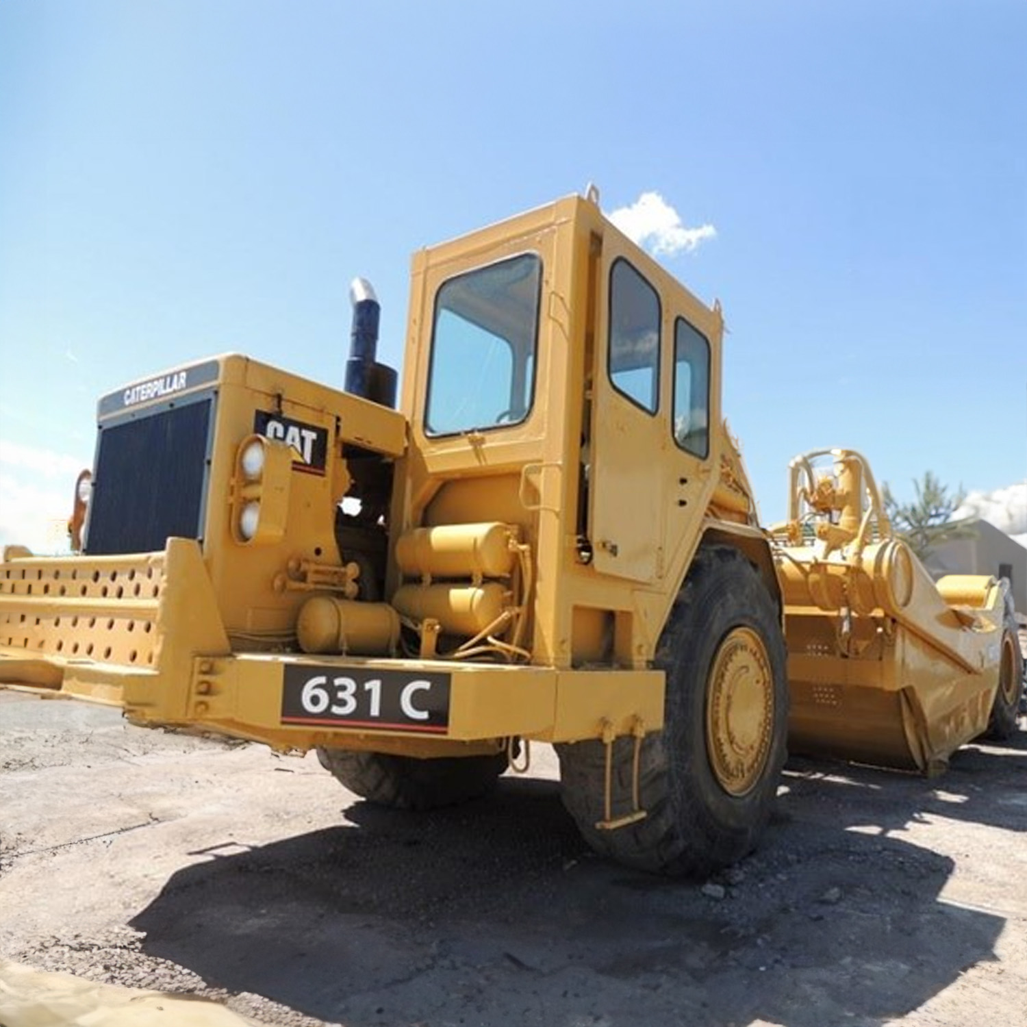 Cat 631C motor scraper sits not in use